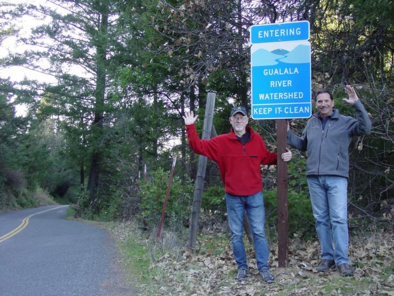 Newly installed sign on Skaggs Springs Road in the eastern part of the Gualala River watershed, with Chris Kelly, California Program Director for The Conservation Fund (right) and Chris Poehlmann, Friends of Gualala River member and volunteer (left)